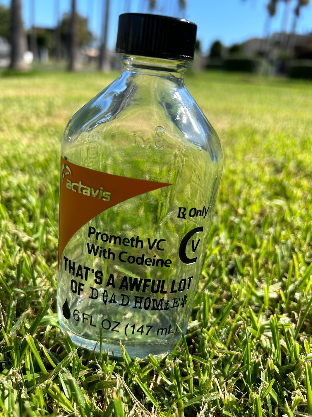 Awful lotta cough syrup x deadhomies bottle